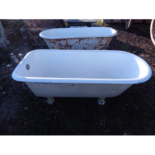 7130 - An early 20th Century French double ended roll top bath on claw feet with waste  (E)  £150-200