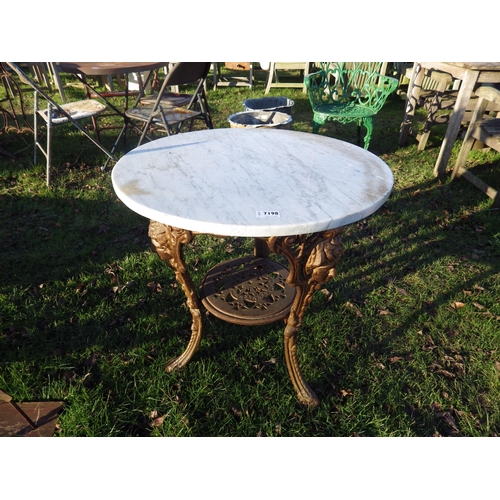 7198 - A cast iron based, circular marble top pub table  (R)  £80