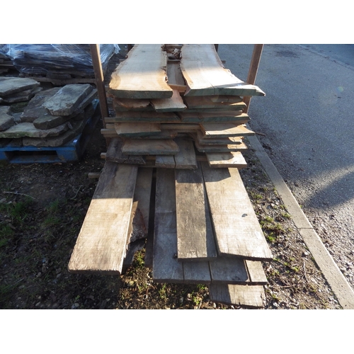 7209 - A collection of oak planks, mixed sizes- stilage not included