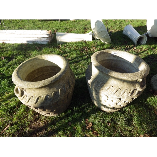 7236 - A pair of Celtic scroll pattern planters, 16