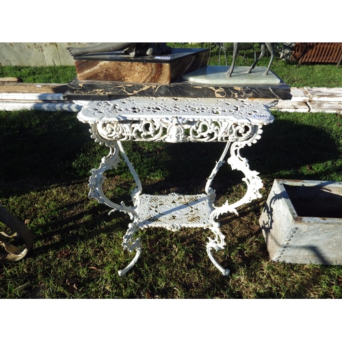 7243 - An Edwardian cast iron decorative conservatory table