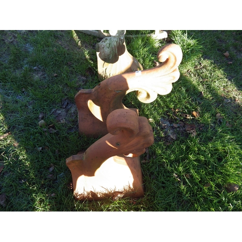 7248 - Two terracotta scrolling ridge tile finials  (E)  £20-40