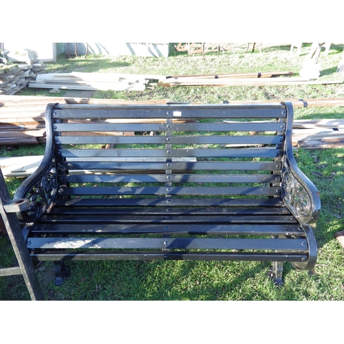 7273 - A 19th Century cast iron ended garden bench with wooden slats, dragon detail to ends, 49.5