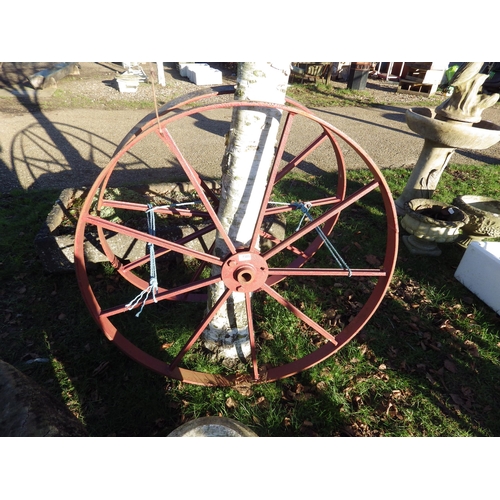 7303 - A pair of iron implement wheels, 42