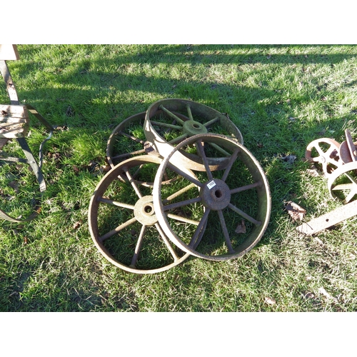 7322 - A set of four iron implement wheels, 20