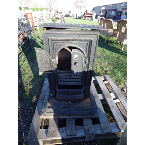 7330 - A cast iron No.3 Rose stove on York stone base, a/f  (R)  £30