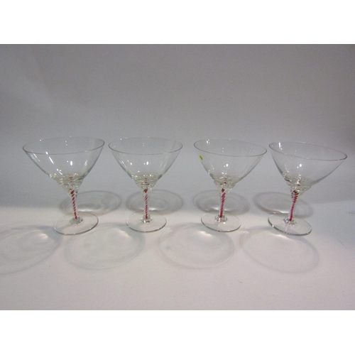 4111 - Six Edwardian champagne glasses with coloured stems