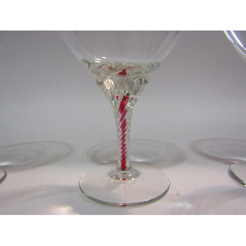 4111 - Six Edwardian champagne glasses with coloured stems