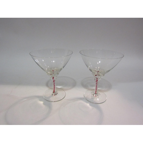 4111 - Six Edwardian champagne glasses with coloured stems