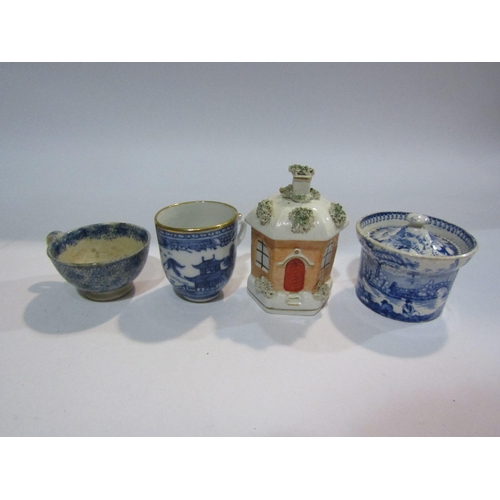 4131 - A Victorian Staffordshire cottage money box and six pieces of Victorian blue and white pottery inclu... 