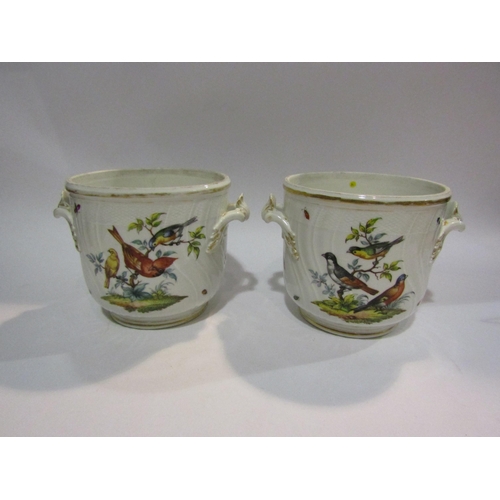 4186 - A pair of Continental porcelain handpainted jardinieres, 17cm tall