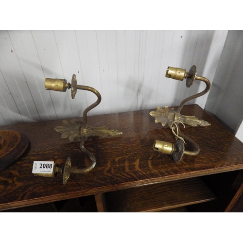 2088 - A pair of Regency style brass twin arm wall lights