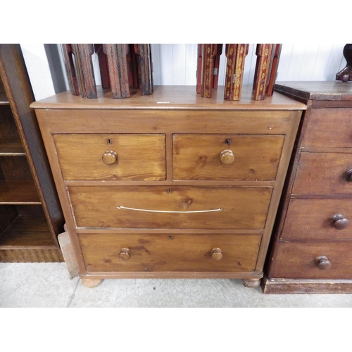 2090 - A Victorian pine and mahogany two over two chest of drawers