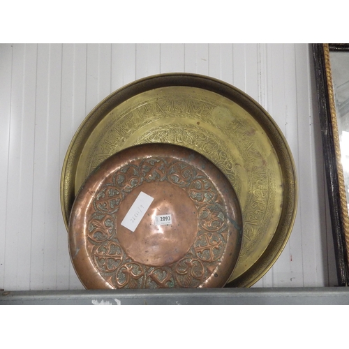 2093 - An Islamic brass tray and an Arts and Crafts copper tray