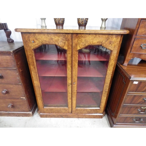 2098 - A Victorian walnut bookcase with four concealed drawers