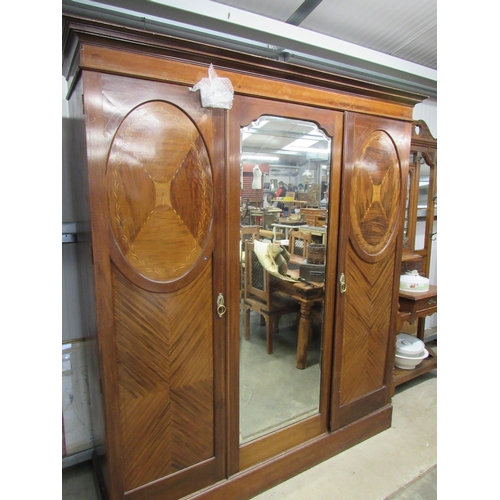 2186 - An Edwardian inlaid mahogany triple wardrobe   (R) £200