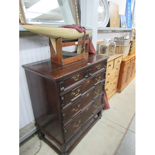 2192 - An 18th Century oak two over three chest of  drawers on stand, fielded panel drawers