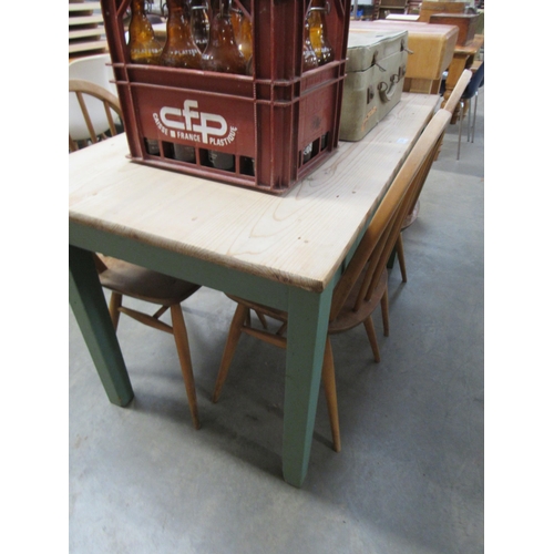 2203 - A rustic pine kitchen table with green painted base, central drawer, 125cm x 70cm