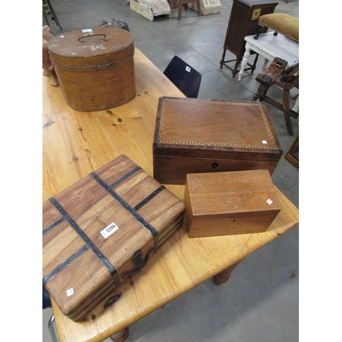 2206 - A desk oak letter/envelope box, an inlaid trinket box and an Eastern hardwood box (3)