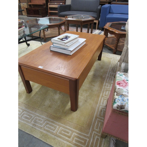 2335 - A Nathan teak coffee table, top raises to reveal a fitted interior