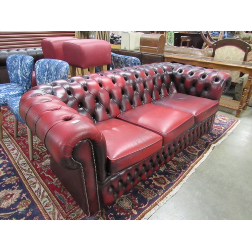 2342 - A red button back three seater pub sofa  (E) £60-90