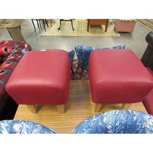 2345 - A pair of red leatherette top stools