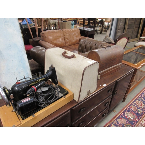 2350 - A cased Singer sewing machine and another