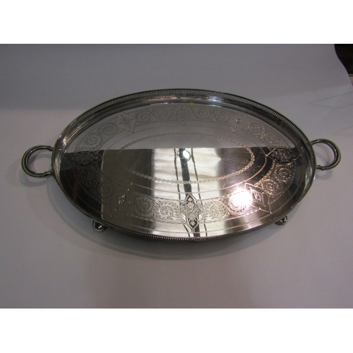 4042 - An Edwardian Walker & Hall silver plated galleried oval tray, 64cm long  (R) £60