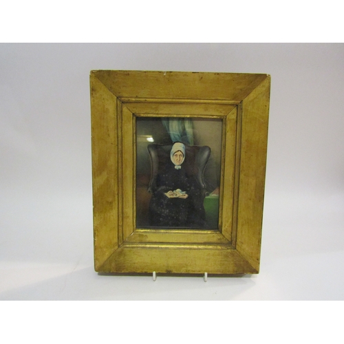 4059 - A primitive 19th Century watercolour of lady in Georgian wing chair, gilt framed and glazed, 18cm x ... 