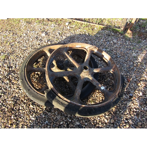 3299 - Two cast wheels