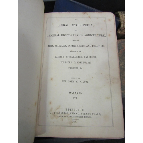 1186 - A box of early 20th Century books including 'Rural Cyclopaedia'