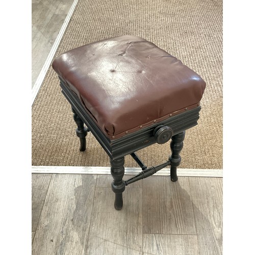 9090 - An Edwardian ebonised adjustable piano stool