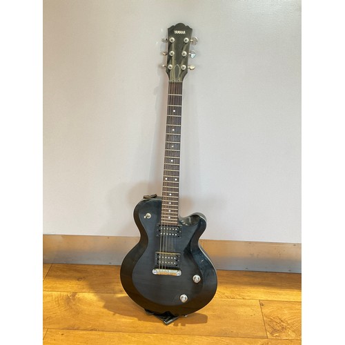 9087 - A Yamaha AES420 electric guitar in black, serial number QKO0007R, of Les Paul form