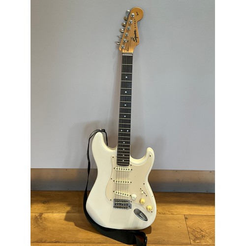 9088 - A Fender Squier ‘Strat’ electric guitar, Olympic White body