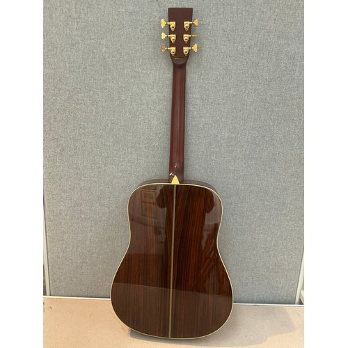 9070 - A Tanglewood TW900 acoustic guitar, western style with bat-wing form pickguard, spruce top with herr... 