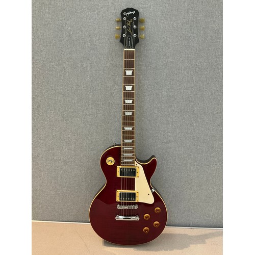 9085 - A Gibson Epiphone Les Paul electric guitar, cherry body, serial no. S 020303411, with Ritter soft ca... 