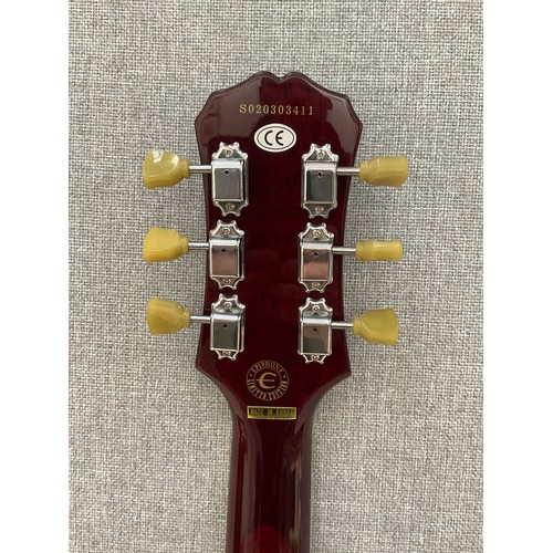 9085 - A Gibson Epiphone Les Paul electric guitar, cherry body, serial no. S 020303411, with Ritter soft ca... 