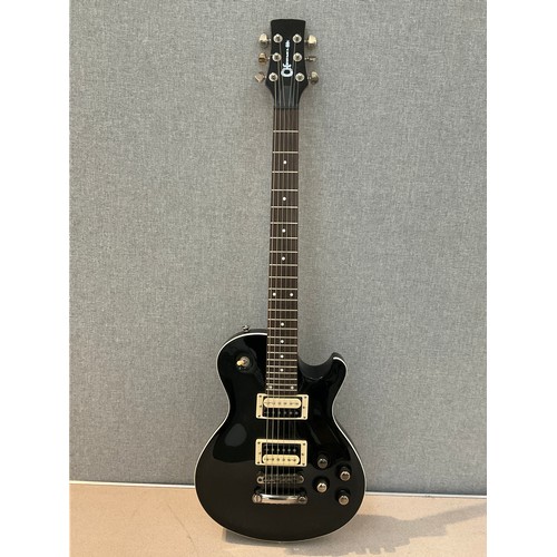 9086 - A Charvel Les Paul style electric guitar, black body, made in China, hard cased. Replacement machine... 