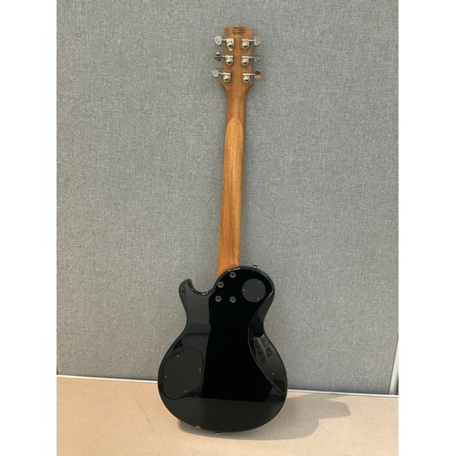 9086 - A Charvel Les Paul style electric guitar, black body, made in China, hard cased. Replacement machine... 