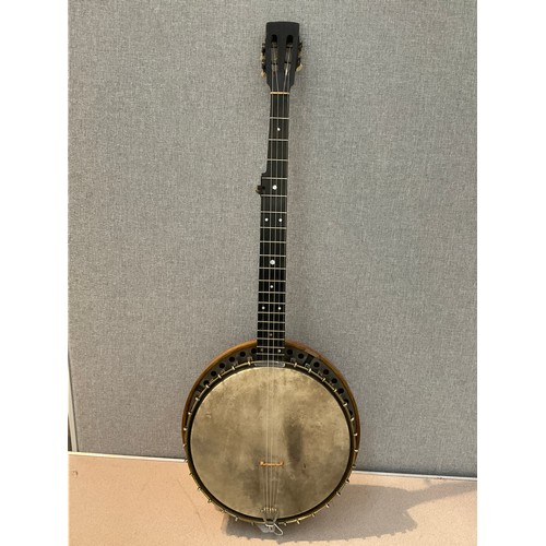 9076 - An early 20th Century five string banjo, closed back, birdseye maple back, some damage, with soft ca... 