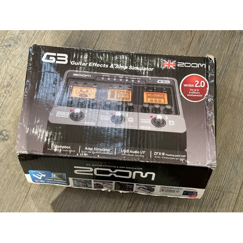 9065 - A Zoom G3 guitar effects and amplifier simulator pedal, boxed