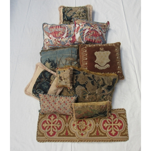 8002 - Ten country house style tapestry cushions, one with armorial crest, a pair of cushions depicting hot... 