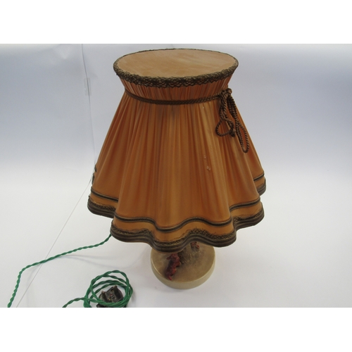 8003 - A Goebel late 1940's table lamp, young girl perched on a tree with dog at her feet holding her slipp... 