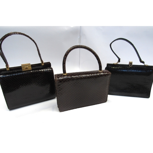 8010 - Three mid 20th Century snakeskin handbags, two brown, one black and a small quantity of ladies glove... 