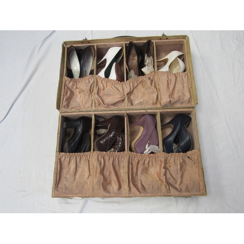 8046 - A vintage leather carrying case for shoes  with mid 20th Century ladies shoe content, together with ... 