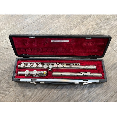 9091 - A J. Michael silver plated flute, cased