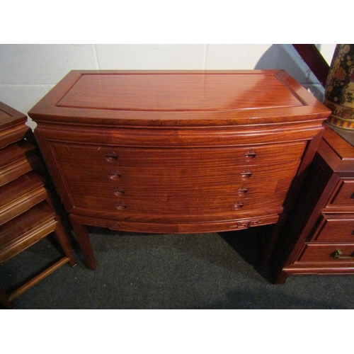 1007 - A Chinese elm chest of three short over two long drawers on shaped foot base, 65cm tall x 81cm wide ... 