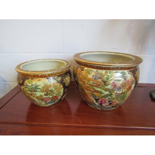 1020 - Two 20th Century graduated Japanese Satsuma jardinieres, largest 24cm high x 32cm diameter