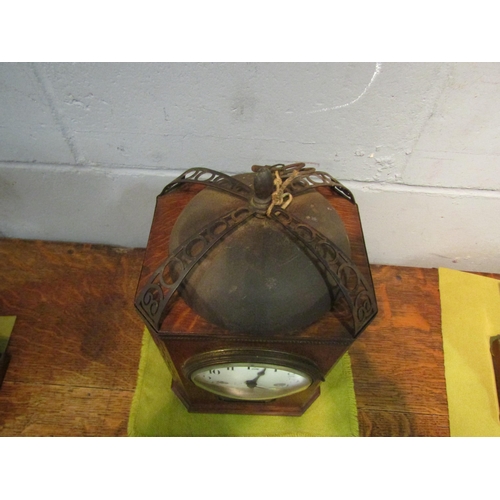 1519 - An oak cased mantel clock striking on a bell, bell 16cm diameter