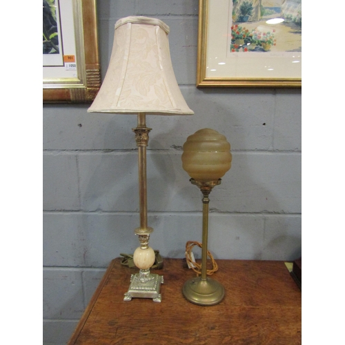 1055 - An Art Deco style brass table lamp with globular shade together with another (2)